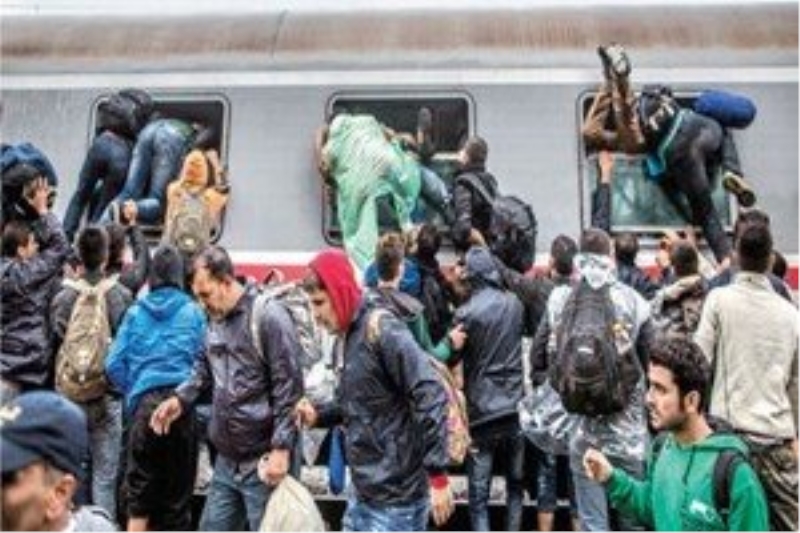 Almanya`dan mültecilere 300 bin kotası!